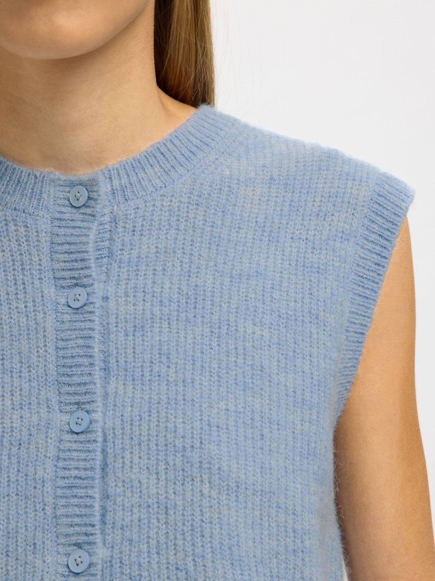 Blue knit vest